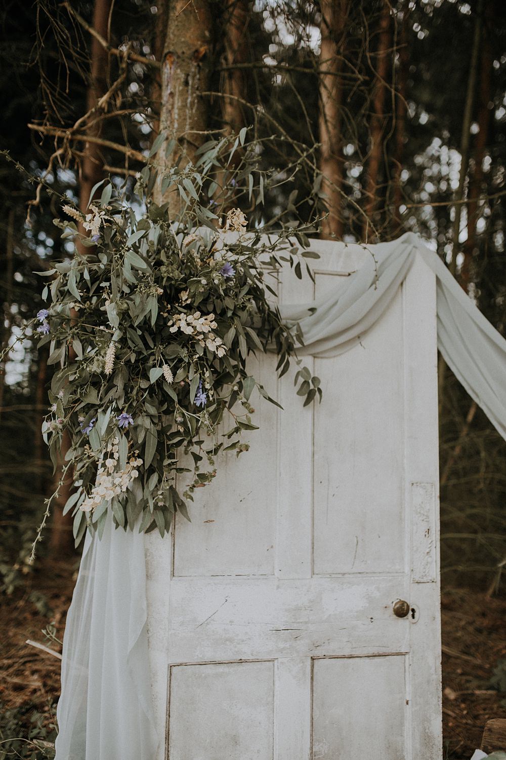 Outdoors Grey Fabric Greenery Foliage Doors Antique Decor Backdrop Bohemian Woodland Wedding Ideas Lola Rose Photography