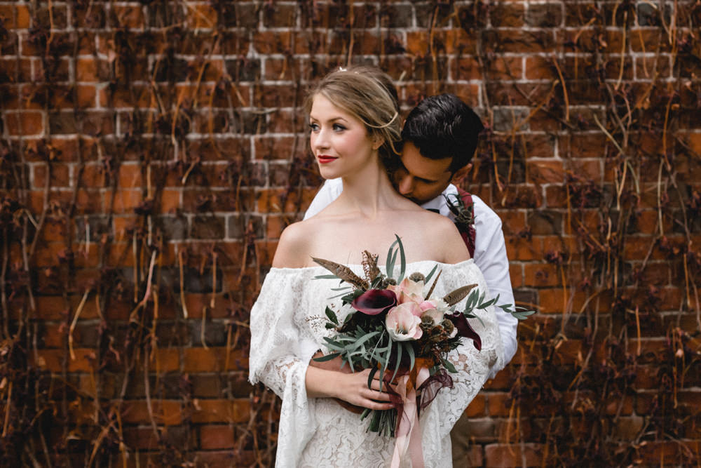 Bouquet Flowers Bride Bridal Ribbons Red Greenery Pink Foliage burgundy Calla Lily Pheasant Feathers Eucalyptus Nicoli Boho Modern Romance Wedding Ideas Masha Unwerth Photography