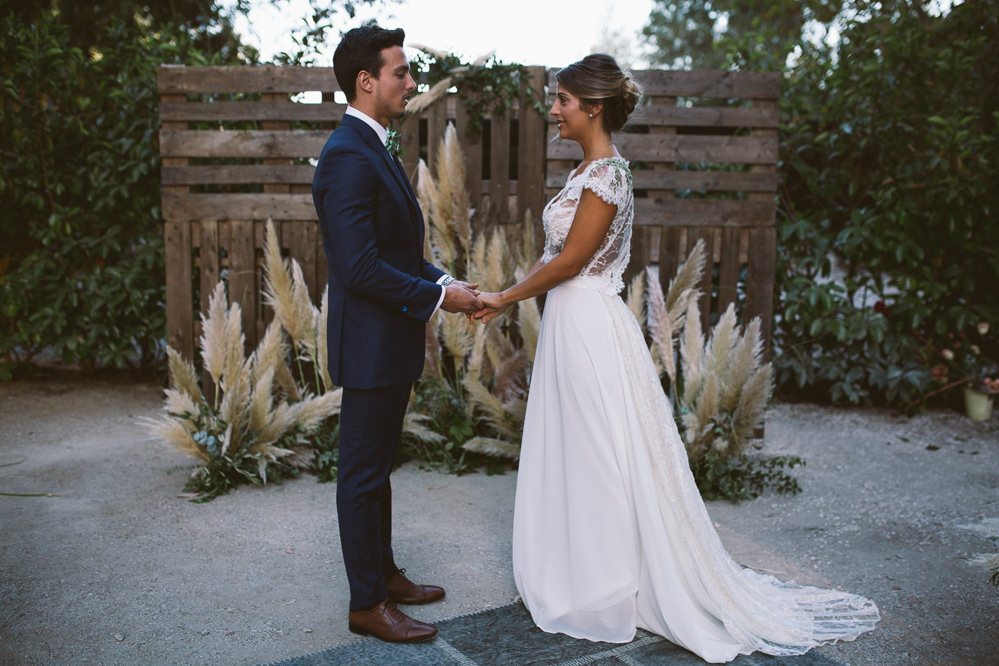Ceremony Aisle Backdrop Wooden Pallet Crates Flowers Botanical Dark Green Velvet Pampas Grass Wedding Ideas Bárbara Araújo Photography