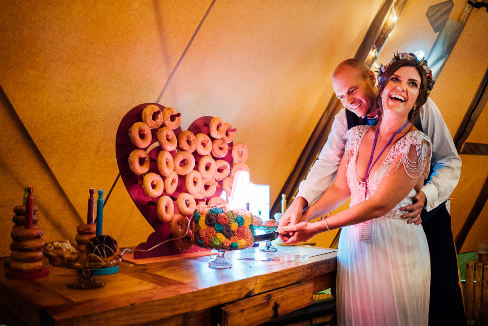 Bride Bridal Embellished Shoulder Beaded Dress Gown Veil Floral Flower Crown Blue Three Piece Suit Groom Dessert Table Donut Cake Colourful Tipi Garden Wedding Fairclough Studios