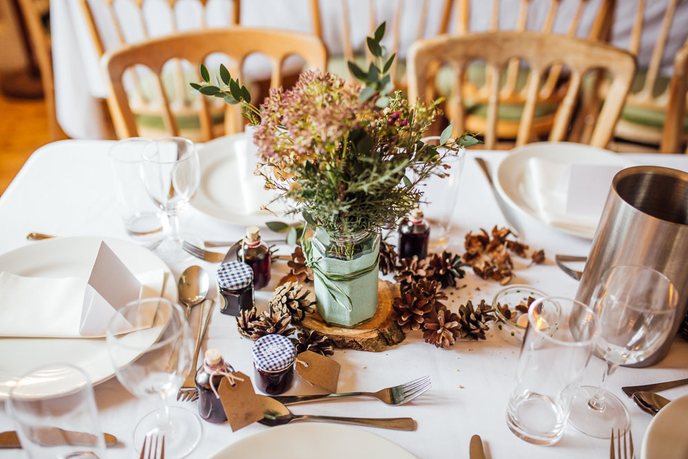Table Centrepiece Flowers Jar Log Slice Pinecones Decor Druidstone Wedding Florence Fox Photography