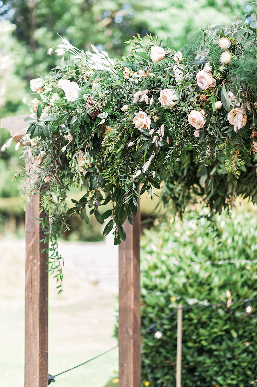 Foliage Pink Rose Archway Backdrop Edmondsham House Wedding Darima Frampton Photography