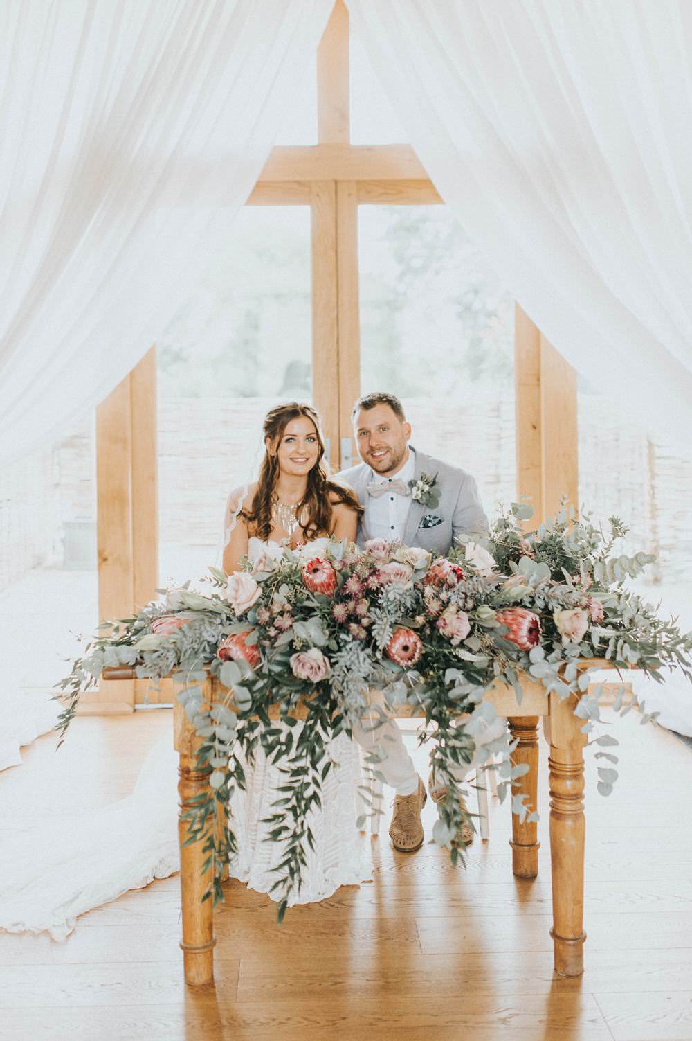 Ceremony Table Flowers Foliage Rose Protea Pink Wild Eucalyptus Boho Greenery Barn Wedding Kerry Diamond Photography