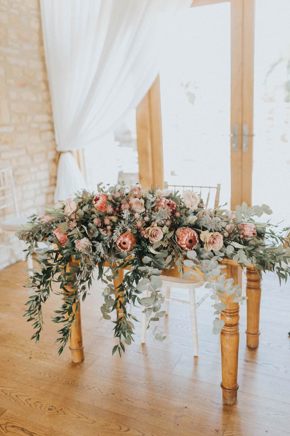 Ceremony Table Flowers Foliage Rose Protea Pink Wild Eucalyptus Boho Greenery Barn Wedding Kerry Diamond Photography