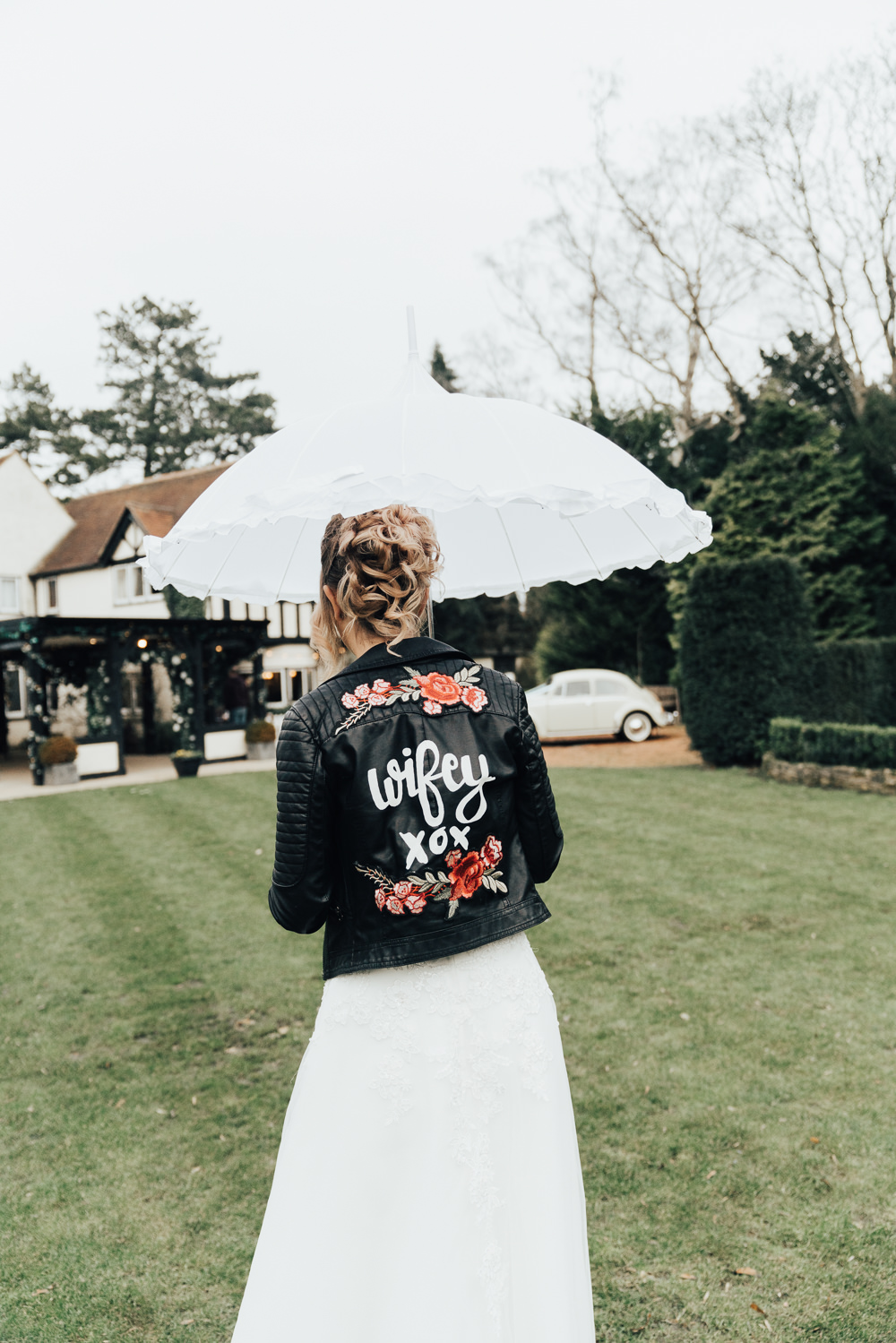 Bride Bridal Jacket Leather Floral Painted Personalised Accessory Hoop Wedding Ideas Rebecca Carpenter Photography
