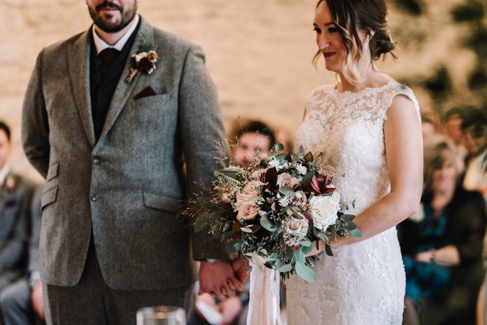 Bouquet Flowers Red Pink Burgundy Bride Bridal Rose Greenery Foliage Ribbons Dahlia Eucalyptus Kingscote Barn Wedding Oobaloos Photography