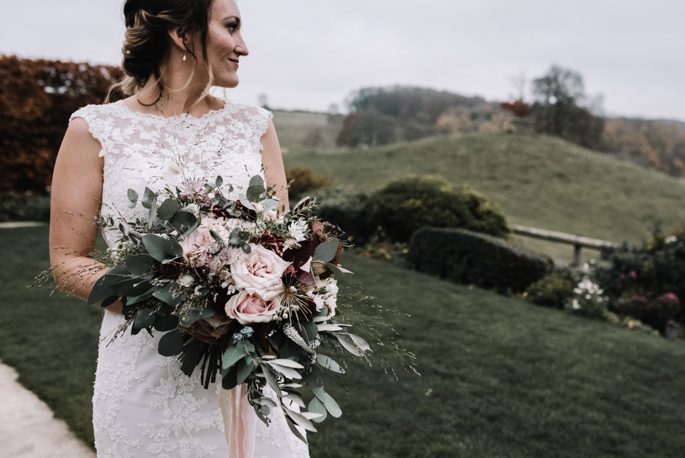 Bouquet Flowers Red Pink Burgundy Bride Bridal Rose Greenery Foliage Ribbons Dahlia Eucalyptus Kingscote Barn Wedding Oobaloos Photography