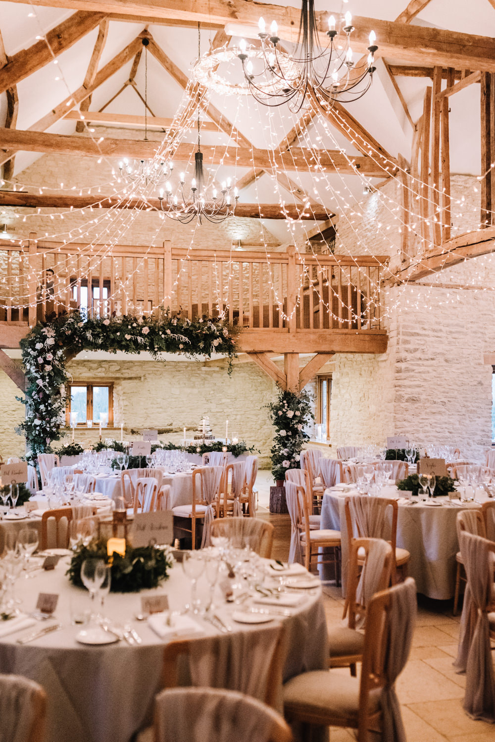 Flower Floral Arch Backdrop Decor Lanterns Greenery Foliage Candles Fern Pink Red Fairy Lights Kingscote Barn Wedding Oobaloos Photography