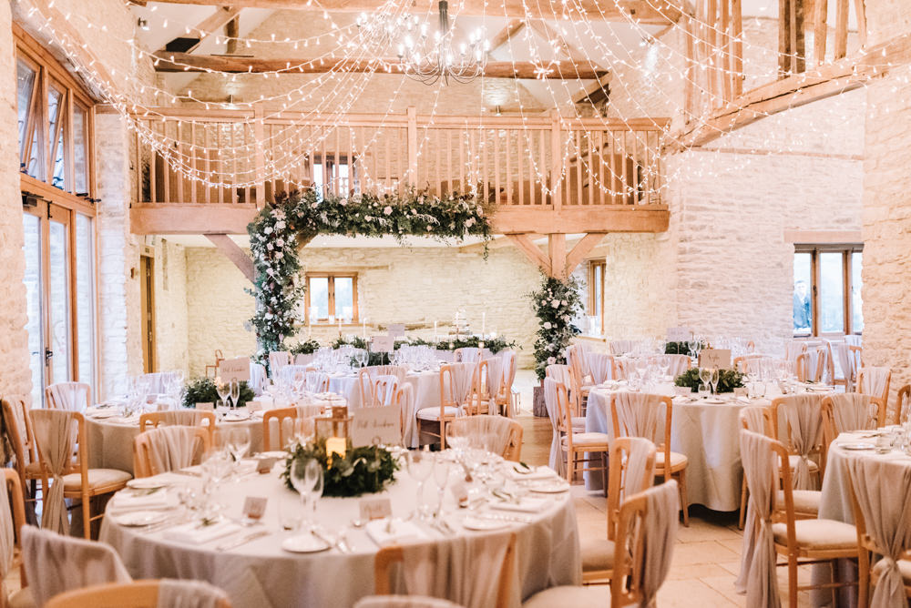 Flower Floral Arch Backdrop Decor Lanterns Greenery Foliage Candles Fern Pink Red Fairy Lights Kingscote Barn Wedding Oobaloos Photography