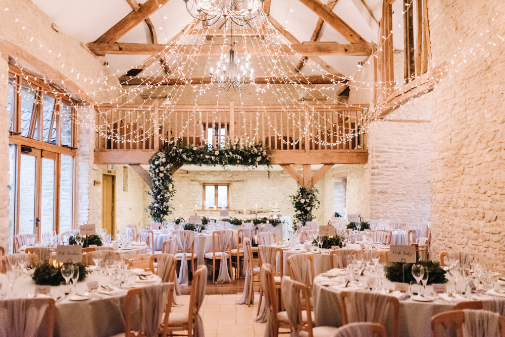Flower Floral Arch Backdrop Decor Lanterns Greenery Foliage Candles Fern Pink Red Fairy Lights Kingscote Barn Wedding Oobaloos Photography