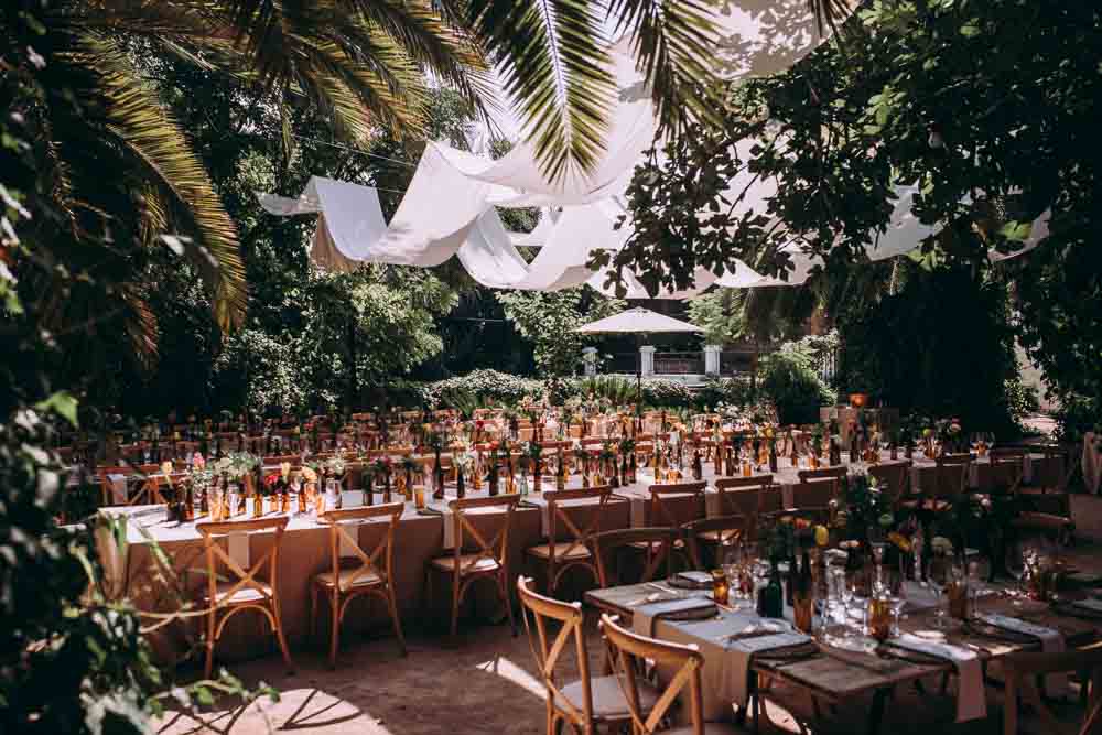 Reception Decor Long Wooden Tables Fabric Drapes Ceiling Botanical Gardens Outdoor Mountain Wedding Spain Lorena Erre