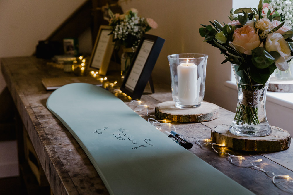 Snowboard Guest Book Wood Slice Log Floral Flowers Glass Vase Nancarrow Farm Wedding Alexa Poppe Wedding Photography