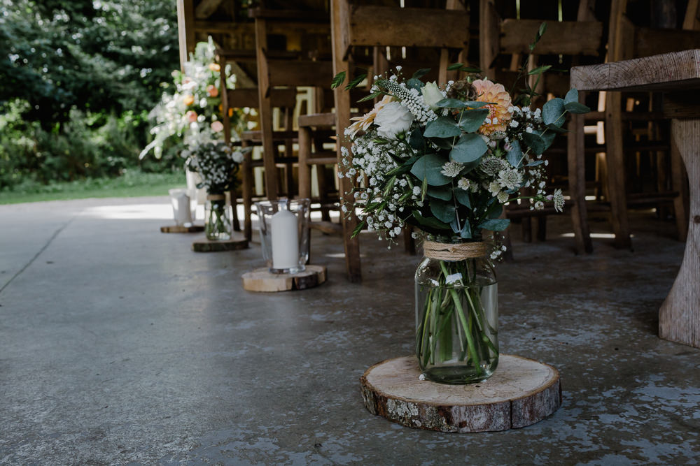 Wood Slice Log Jam Jar Twine Flowers Floral Greenery Gypsophila Nancarrow Farm Wedding Alexa Poppe Wedding Photography