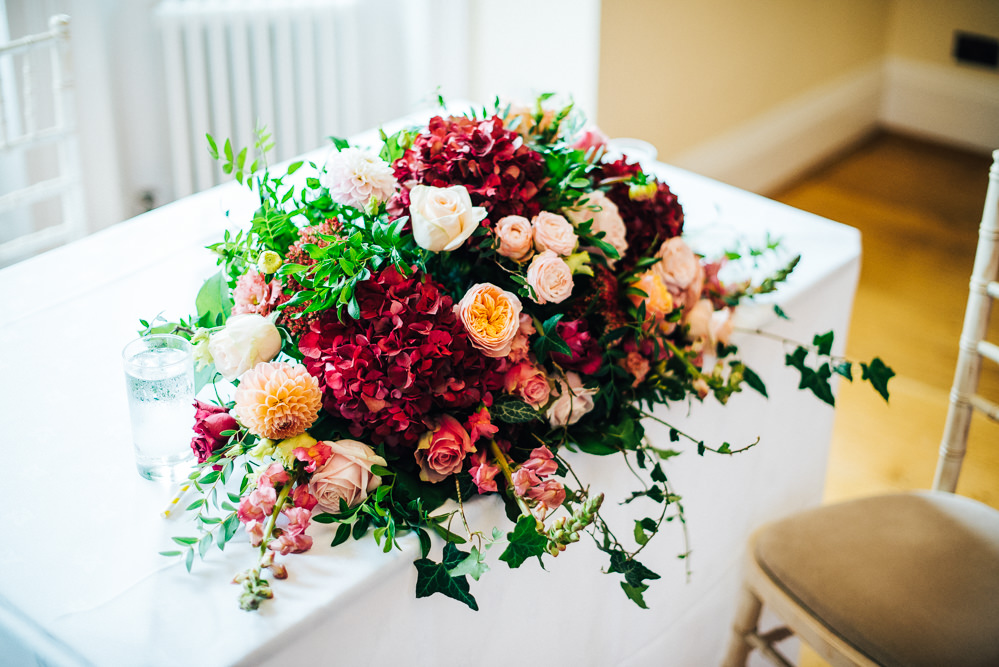 Table Flowers Burgundy Hydrangea Orange Daliah Rose Greenery Foliage Pembroke Lodge Wedding Mark O'Brien Photography
