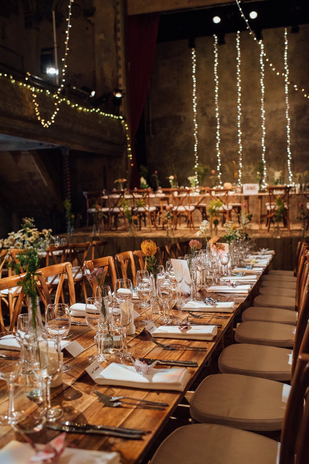 Long Tables Fairy Lights Decor Rustic Wooden Trestle Flowers Bottles Origami Cranes Wilton's Music Hall Wedding The Shannons Photography