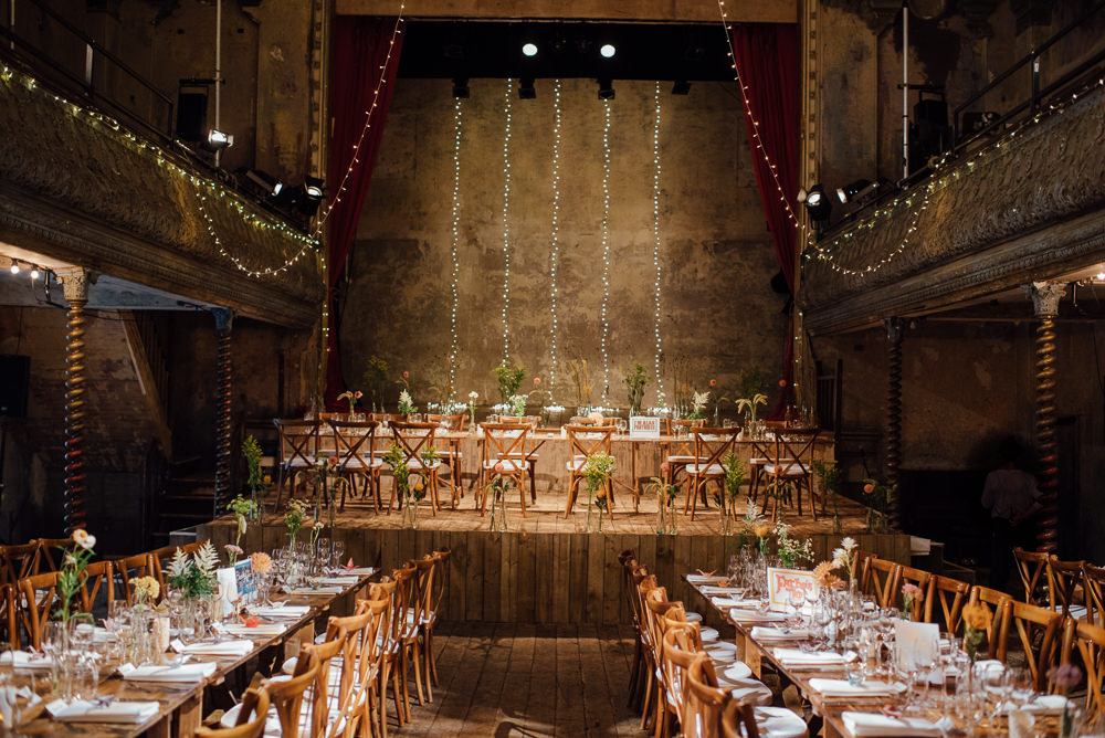 Long Tables Fairy Lights Decor Rustic Wooden Trestle Flowers Bottles Origami Cranes Wilton's Music Hall Wedding The Shannons Photography