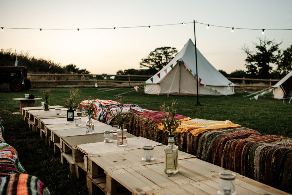 Outdoor Seating Hay Bales Pallets Boho Festoon Lighting Stanford Farm Wedding Andy Griffiths Photography