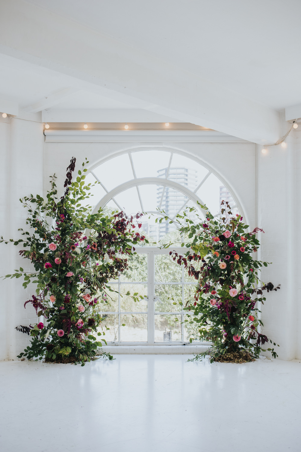 Ceremony Aisle Backdrop Arch Flower Floral Installation Wild Natural Pretty Greenery Foliage Pink Wimborne House Wedding Eva Photography
