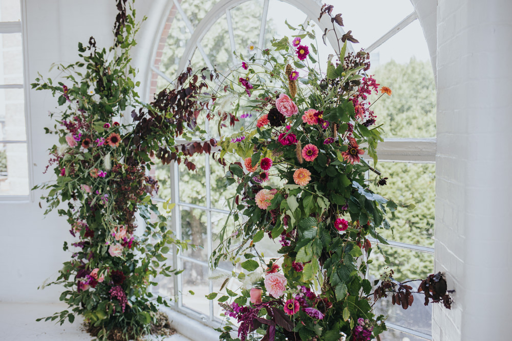 Ceremony Aisle Backdrop Arch Flower Floral Installation Wild Natural Pretty Greenery Foliage Pink Wimborne House Wedding Eva Photography