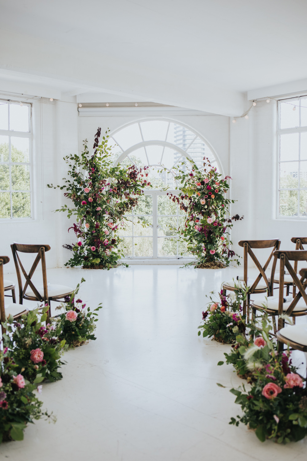 Ceremony Aisle Backdrop Arch Flower Floral Installation Wild Natural Pretty Greenery Foliage Pink Wimborne House Wedding Eva Photography