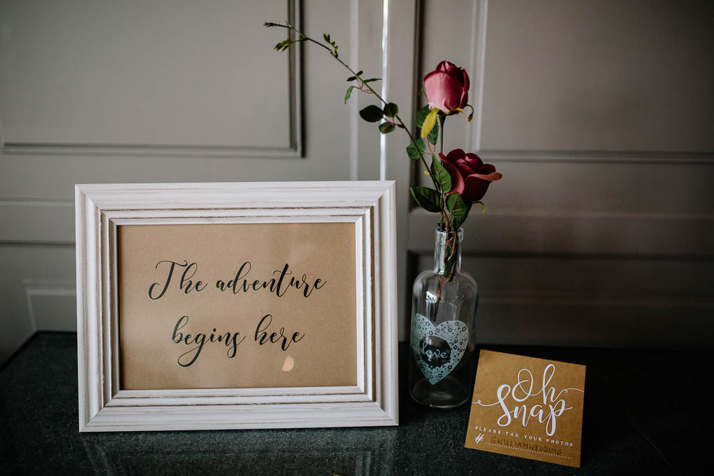 The Adventure Begins Here Sign Frame Rose Bottle Yorkshire Wedding Barn Anna Rose Photography
