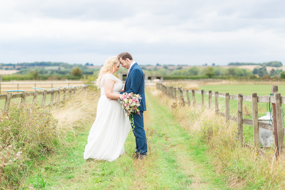 Bride Bridal Short Sleeve Lace V Neck Dress Gown Navy Wool Tweed Suit Groom Waterfall Bouquet Bedfordshire Tipi Wedding Natalie Stevenson Photography