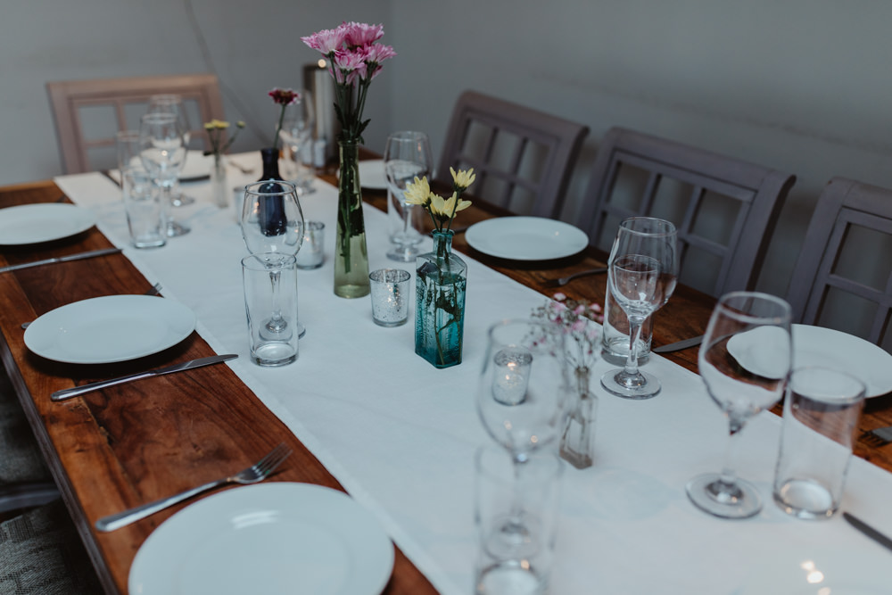Simple Wooden Table Decor Flowers Bottles Chilli Barn Wedding Stevie Jay Photography