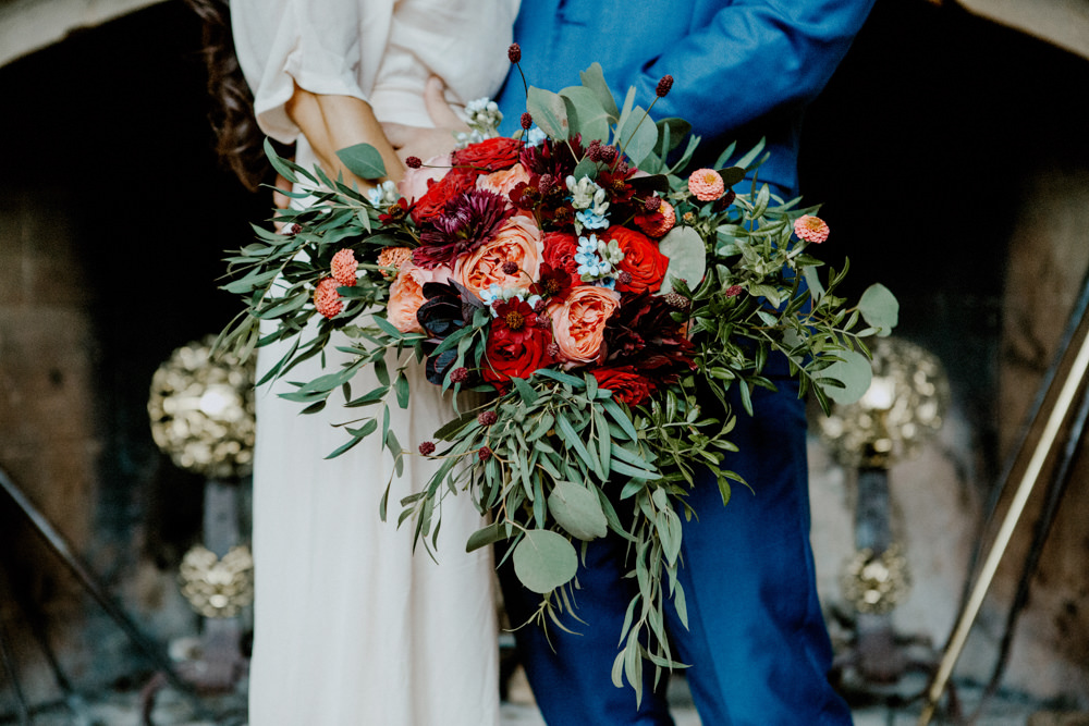 Bouquet Flowers Bride Bridal Greenery Foliage Rose Red Orange Cosmos Dahlias Oxypetalum Ethereal Romantic Wedding Ideas Katherine Newman Photography