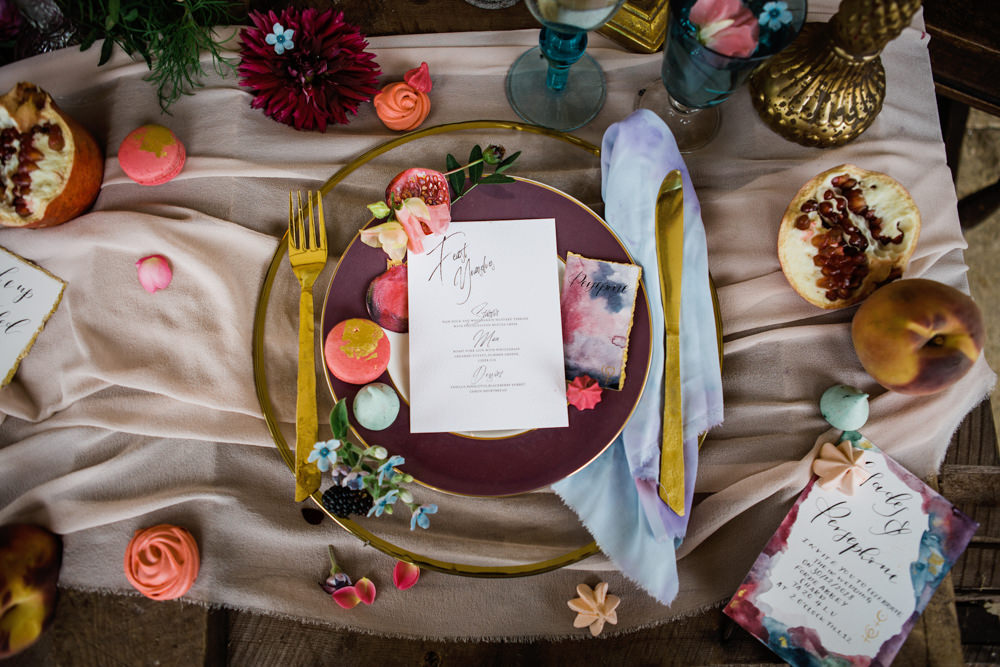 Place Setting Plate Decor Gold Cutlery Plum Stationery Napkin Fruit Ethereal Romantic Wedding Ideas Katherine Newman Photography
