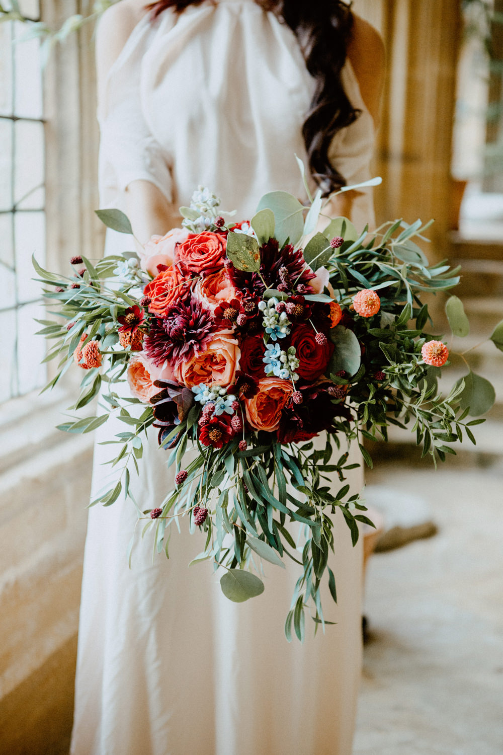 Bouquet Flowers Bride Bridal Greenery Foliage Rose Red Orange Cosmos Dahlias Oxypetalum Ethereal Romantic Wedding Ideas Katherine Newman Photography