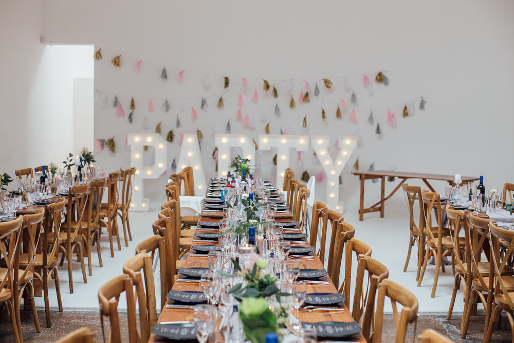 Long Rustic Tables PARTY Letter Lights Fivefourstudios Wedding Ellie Grace Photography