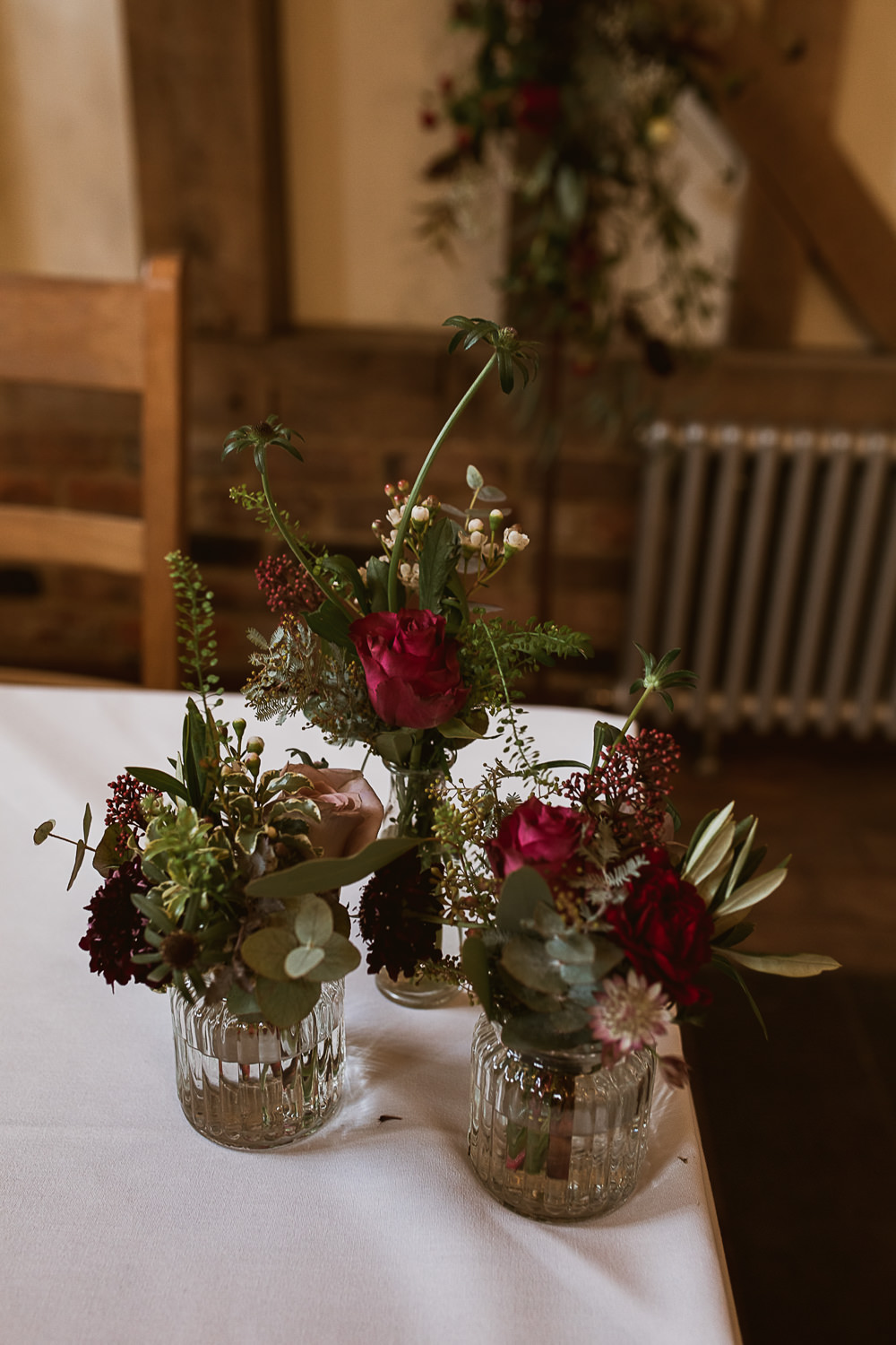 Bottle Jar Flowers Greenery Foliage Red Burgundy Rose Gate Street Barn Wedding The Springles