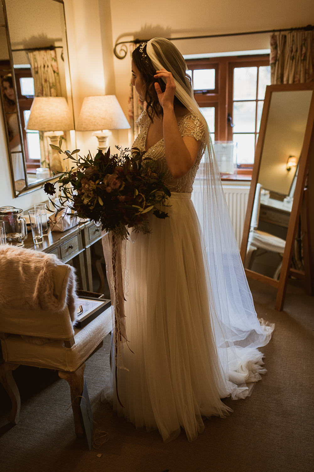 Bouquet Flowers Bride Bridal Foliage Greenery Rose Anemone Ribbons Sottero and Midgley Kallin Top Skirt Bride Bridal Beaded Sequin Cap Sleeve Veil Gate Street Barn Wedding The Springles