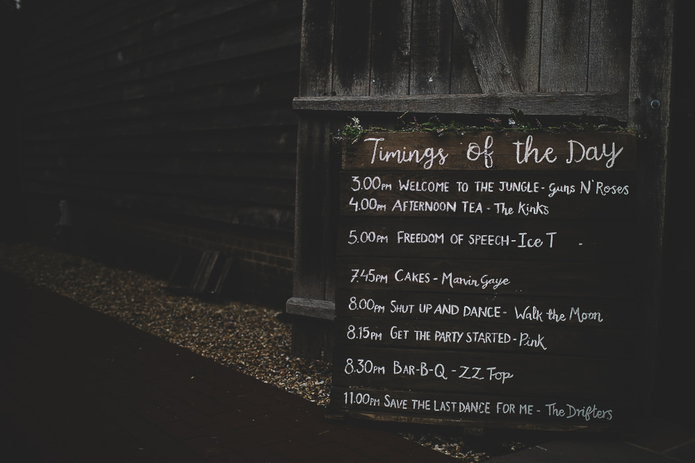 Wooden Rustic Sign Timings Signage Gilbert Whites House Barn Wedding Carrie Lavers Photography