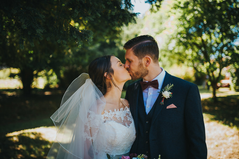 Bride Bridal Dress Gown Sweetheart Bolero Off Shoulder Lace Navy Suit Groom Burgundy Oxblood Bow Tie Veil Kittisford Barton Wedding Joab Smith Photography
