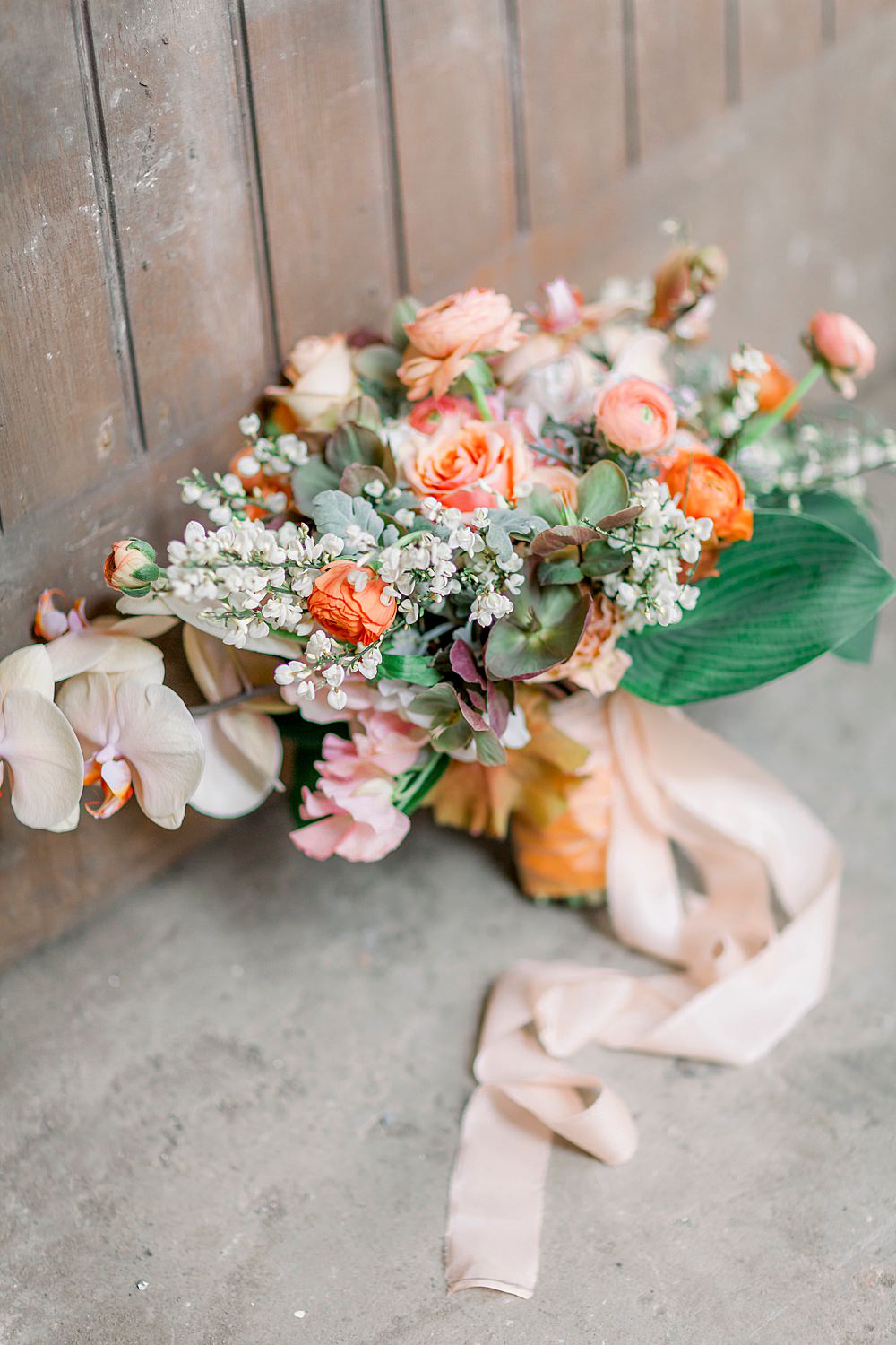 Bouquet Flowers Bride Bridal Coral Orange Silk Ribbons Rose Orchid Ranunculus Natural Boho Industrial Wedding Ideas Jo Bradbury Photography