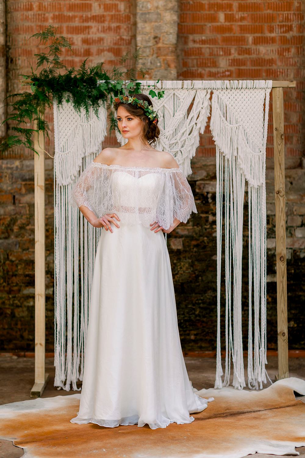 Dress Gown Bride Bridal Stelfox Bride Lace Cape Top Backdrop Macrame Wooden Frame Greenery Aisle Ceremony Natural Boho Industrial Wedding Ideas Jo Bradbury Photography