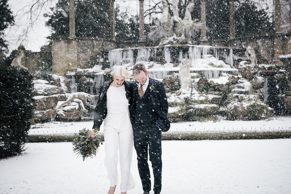 Bride Bridal House of Ollichon Jumpsuit Trousers Lace Sleeves Back Greenery Foliage Bouquet Flowers Leather Jacket Orleans House Gallery Wedding My Beautiful Bride Photography