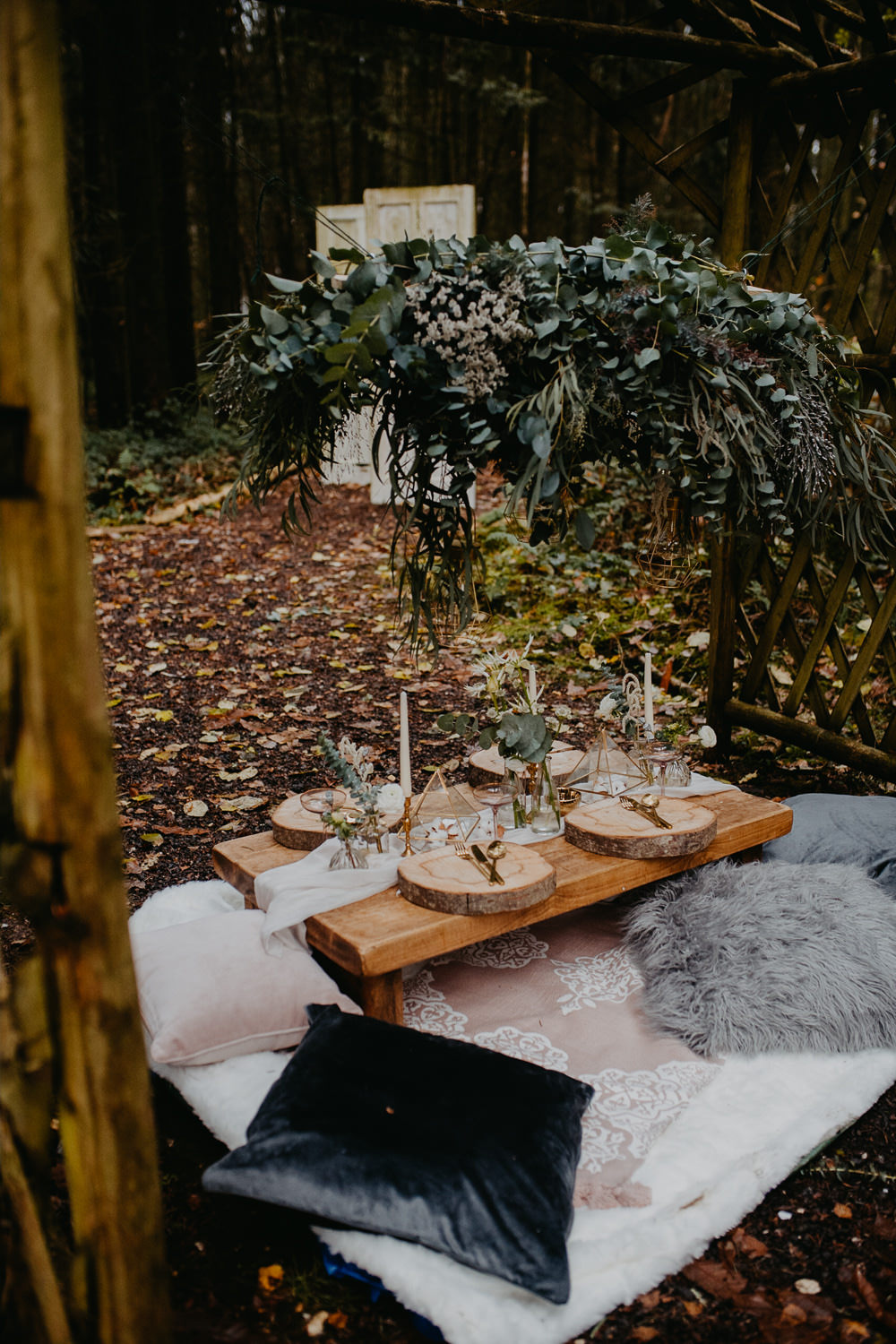 Tablescape Decor Table Greenery Foliage Suspended Hanging Installation Outdoor Woodland Wedding Ideas Geometric Meraki Wedding PhotographyTablescape Decor Table Greenery Foliage Suspended Hanging Installation