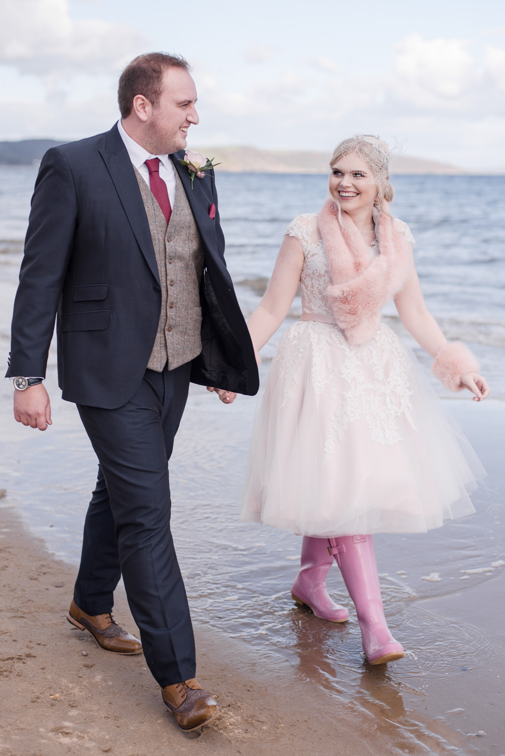 Bride Bridal Short Tea Length Dress Lace V Neck Short Sleeved Tweed Waistcoat Groom Blush Burgundy Pink Fur Stole Cuff Wellies Penally Abbey Wedding Eleanor Jane Photography