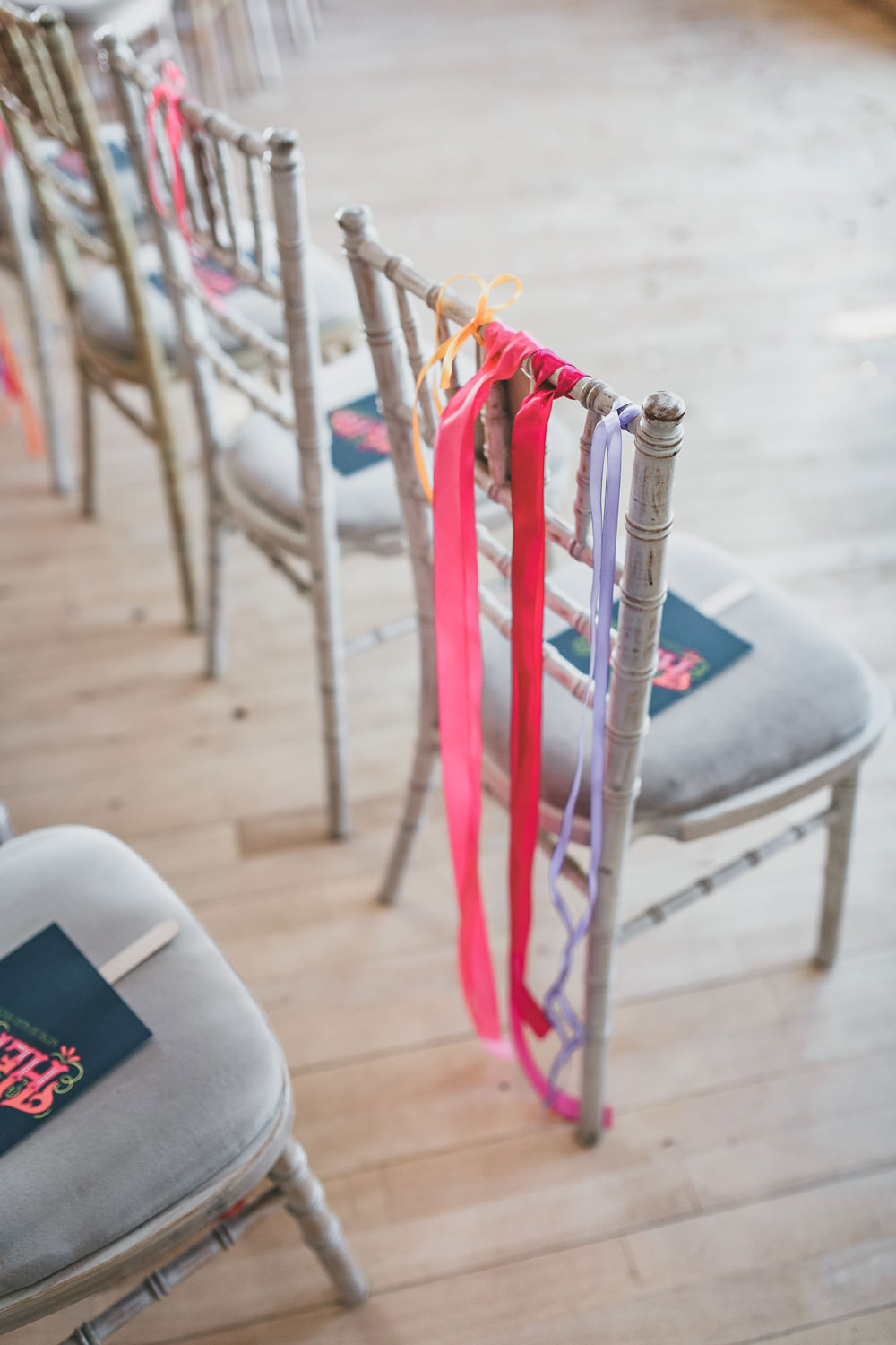 Ribbons Chairs Colourful Decor Rock Village Hall Wedding Lucie Hamilton Photography