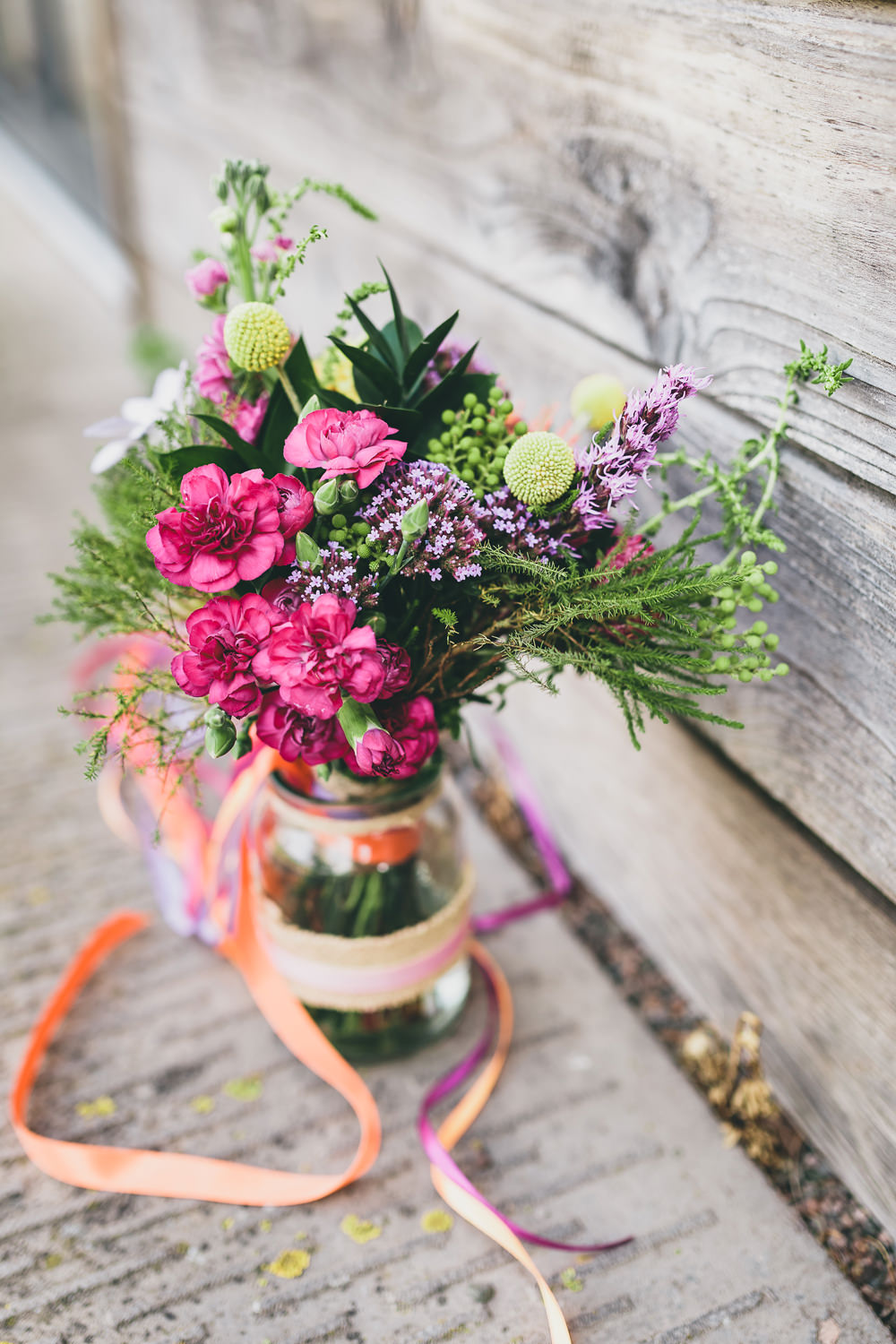 Bouquet Flowers Bride Bridal Colourful Bright Ribbons Pink Purple Yellow Billy Balls Rock Village Hall Wedding Lucie Hamilton Photography
