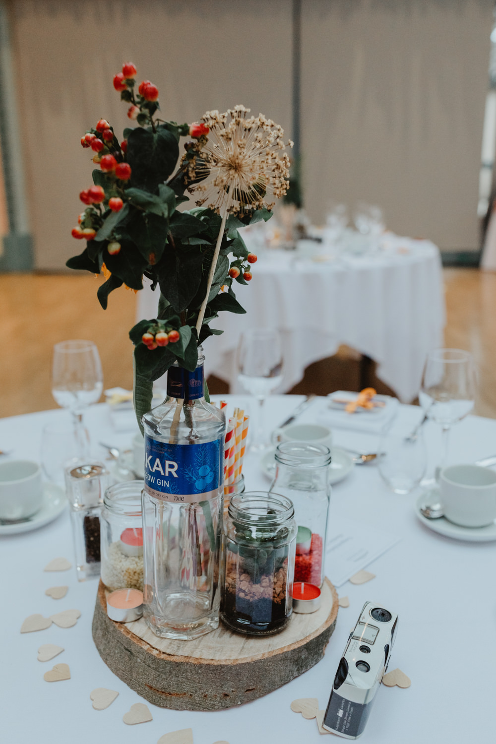 Wood Slice Table Centre Bottle Berries Sun Pavilion Wedding Stevie Jay Photography