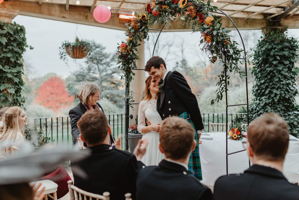 Bride Bridal Sweetheart Neckline Dress Gown Three Quarter Sleeve Cover Up Hair Vine Kilt Groom Sun Pavilion Wedding Stevie Jay Photography