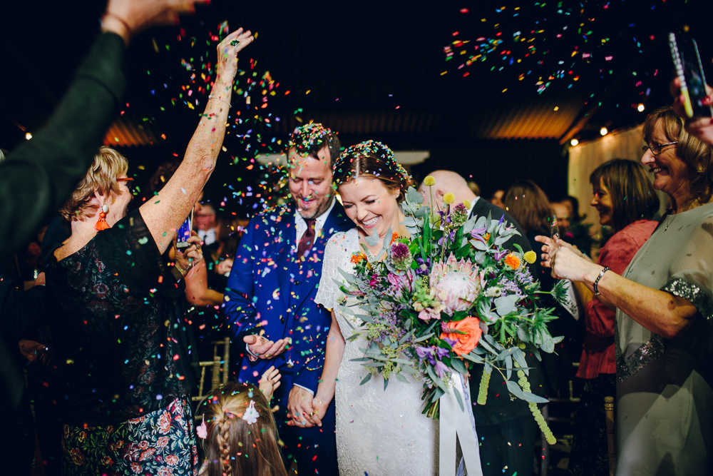 Bride Bridal V Neck Sleeves Beaded Detail Dress Gown Blue Suit Groom Tropical Bouquet Confetti Tatton Wedding Stock Farm Barn Amy B Photography