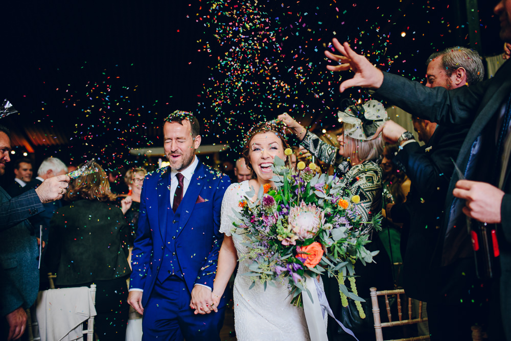 Bride Bridal V Neck Sleeves Beaded Detail Dress Gown Blue Suit Groom Tropical Bouquet Confetti Tatton Wedding Stock Farm Barn Amy B Photography