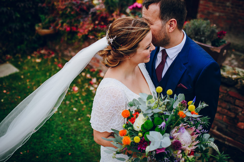Bride Bridal V Neck Sleeves Beaded Detail Dress Gown Blue Suit Groom Veil Tropical Bouquet Tatton Wedding Stock Farm Barn Amy B Photography