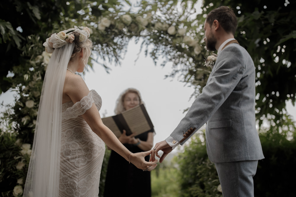 Ceremony Outdoors Backdrop Flowers Arch Floral Greenery Foliage Tuscany Destination Wedding ZONZO