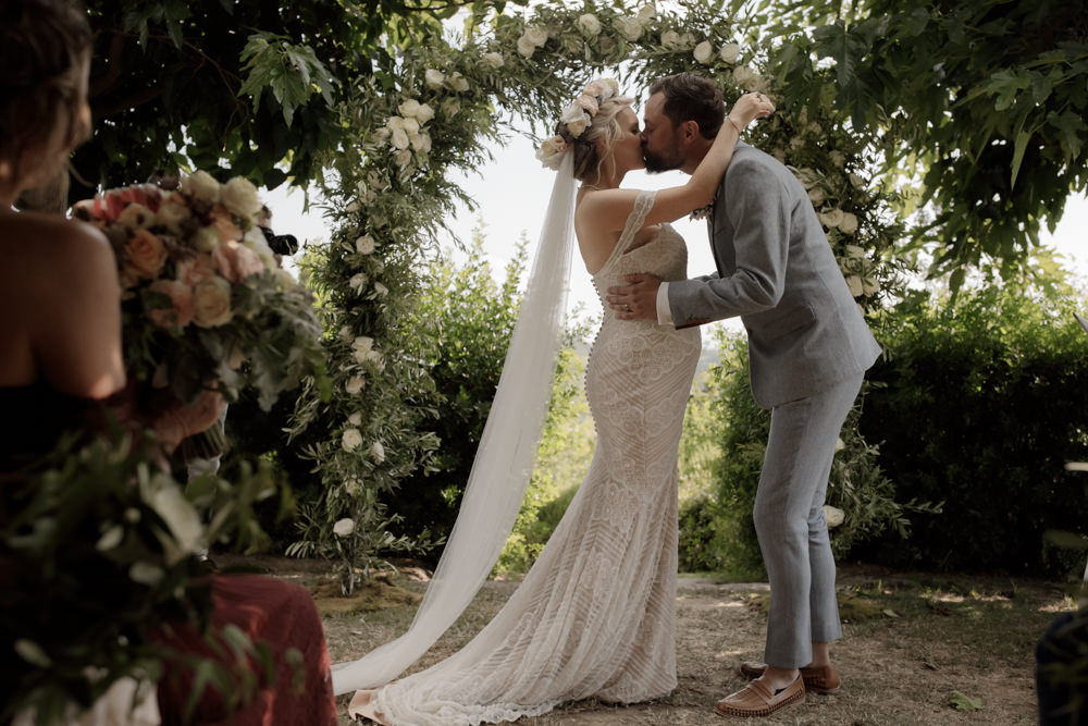Ceremony Outdoors Backdrop Flowers Arch Floral Greenery Foliage Tuscany Destination Wedding ZONZO
