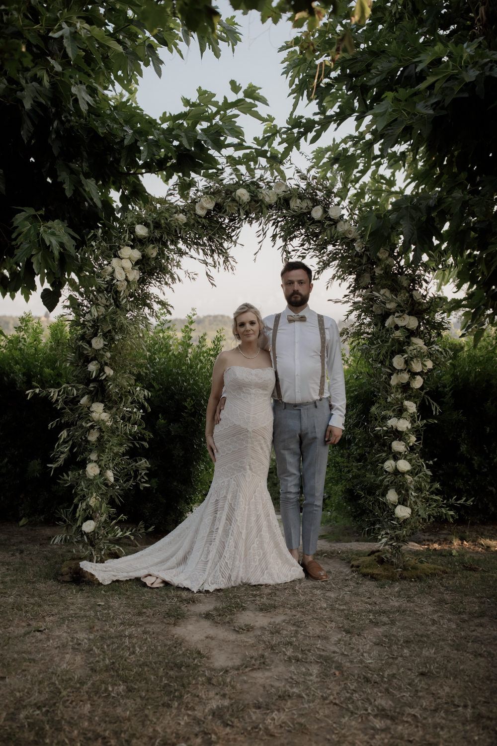 Ceremony Outdoors Backdrop Flowers Arch Floral Greenery Foliage Tuscany Destination Wedding ZONZO